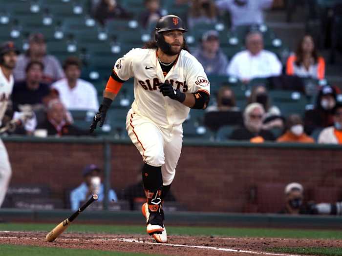Jun 5, 2021; San Francisco, California, USA; San Francisco Giants shortstop Brandon Crawford (35) hits a double during the fifth inning against the Chicago Cubs at Oracle Park.